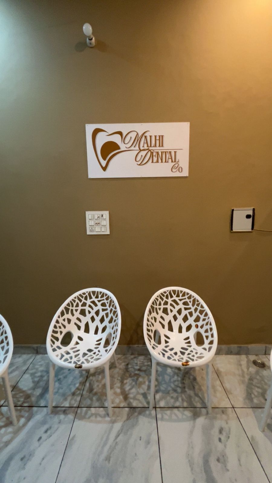 Branded reception with designer chairs